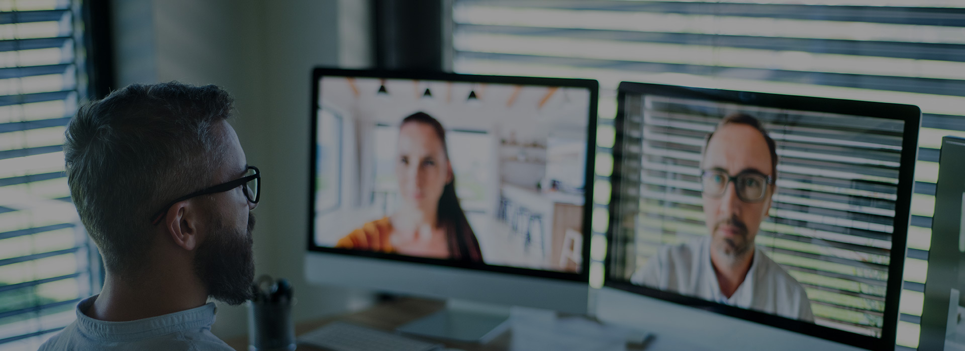 The man conducting a video conference