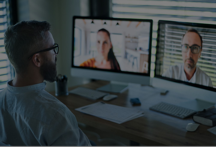 The man conducting a video conference